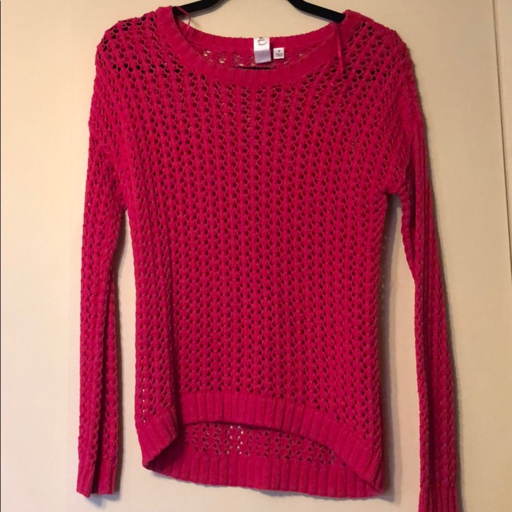 Pink sweater with eyelet details